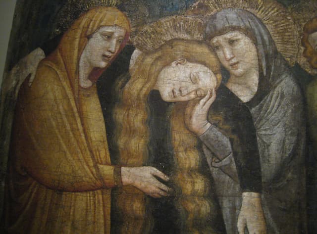 Ein abstraktes Gemälde mit verschiedenen Formen und Farben auf einer Leinwand.