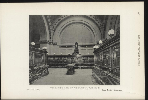 Schwarzes und weißes Foto des Bankettsaal der National Park Bank in New York City, mit Tischen, Lampen, einer Uhr an der Wand und Text unten.