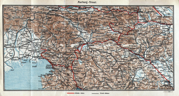 Ein detaillierter alter Stadtplan von Marburg, Deutschland, der Straßen, Gebäude und Landmarken zeigt, mit Text oben und unten.