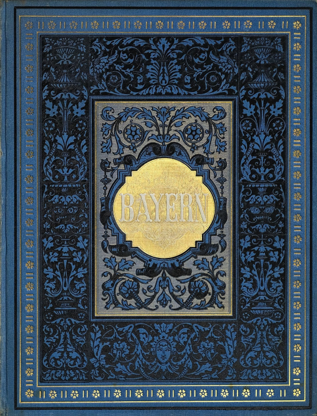 Ein blau-goldenes Buch mit der Aufschrift "Bayern" auf dem Cover, das mit aufwändigen dekorativen Designs verziert ist.