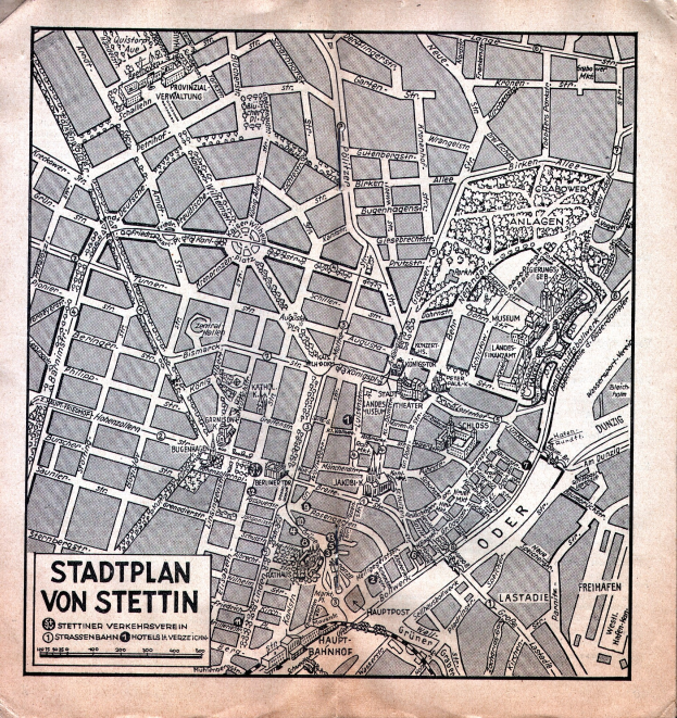 Ein altes, detailliertes Papier-Stadtplan von Stuttgart, der Straßen, Gebäude und Sehenswürdigkeiten zeigt, mit zusätzlichem Text, der Informationen bereitstellt.
