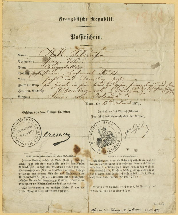 Gelbes deutsches Regierungsdokument mit einem kreisförmigen schwarzen Randstempel und schwarzer Tinte.