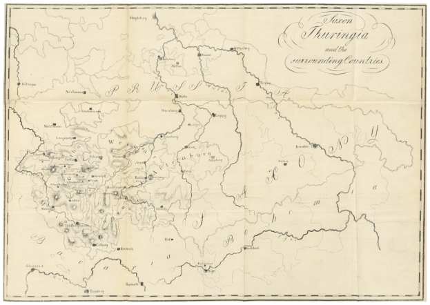 Eine Papierkarte des Königreichs Thüringen und der umliegenden Länder, mit Text zur Beschreibung der Grenzen und Regionen.
